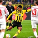 Dortmund beat Augsburg in seven-goal thriller